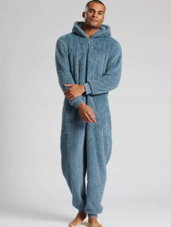 image of man in one-color pajamas